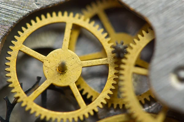 時計じかけの中黄金の金属歯車との背景 あなたのビジネスの成功の設計のための概念的な写真 マクロ — ストック写真