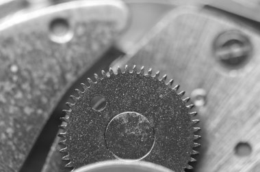 metal cogwheels ile arka plan bir saat gibi. Makro