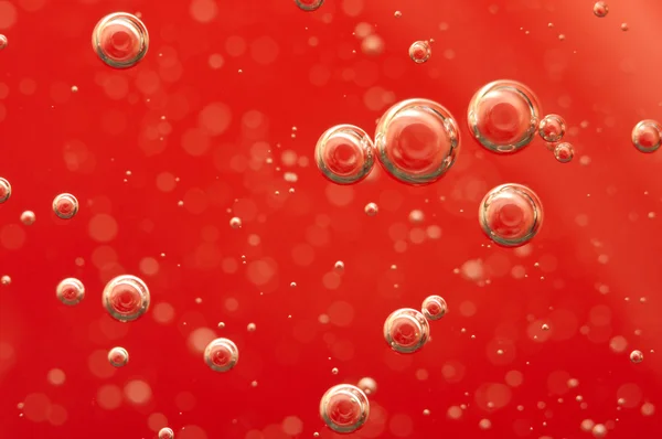 빨간 액체에 공기 방울 — 스톡 사진