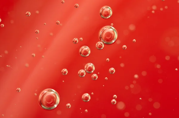 빨간 액체에 공기 방울 — 스톡 사진