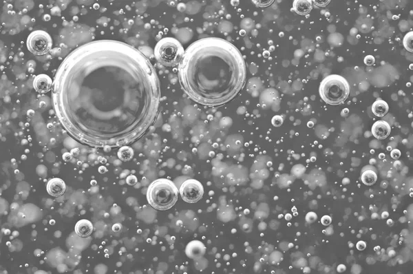 Black-and-white Macro Oxygen bubbles in water — Stock Photo, Image