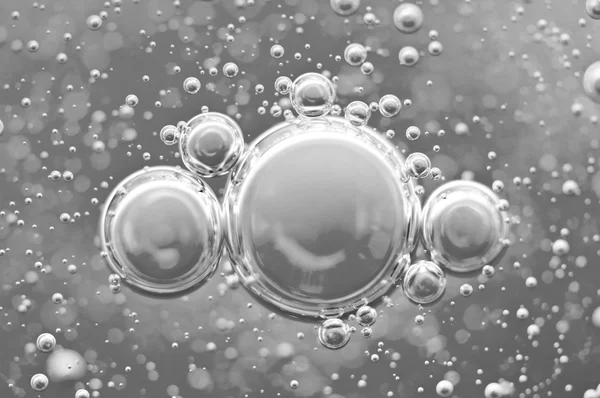 Zwart-wit Macro zuurstofbellen in water — Stockfoto