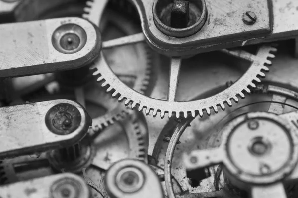 Black and white macro photo close-up view of metal clockwork — Stock Photo, Image