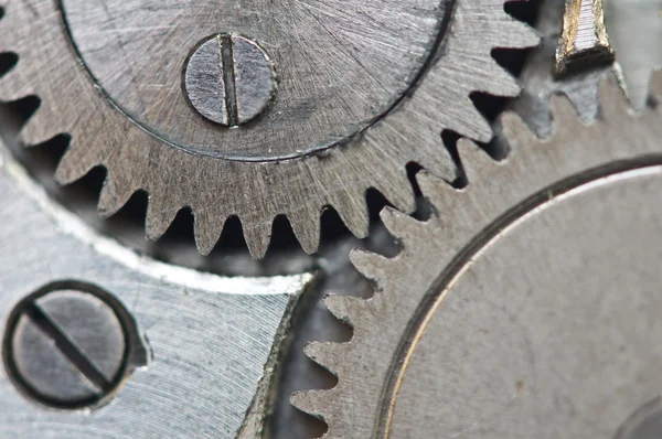 Zahnräder aus Metall im Uhrwerk, Makro. — Stockfoto