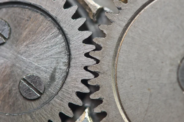 Cogwheels de metal en Reloj Antiguo, Macro . — Foto de Stock