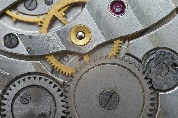 Cogwheels de metal en Reloj Antiguo, Macro . — Foto de Stock