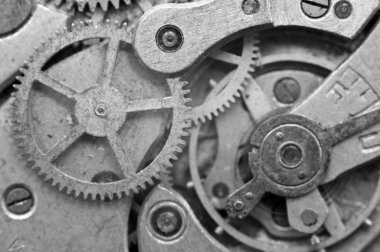 Siyah-Beyaz Metal Cogwheels en eski saat, makro içinde.