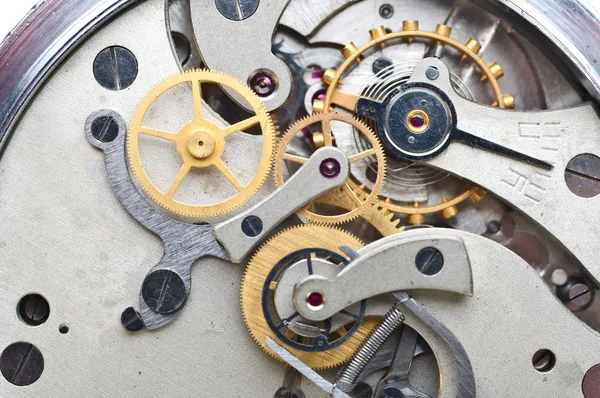 Ruedas dentadas de metal dentro del reloj. macro foto conceptual . —  Fotos de Stock