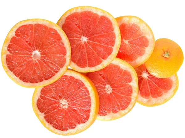 Grapefruit cut in to slices close up top view isolated — Stock Photo, Image