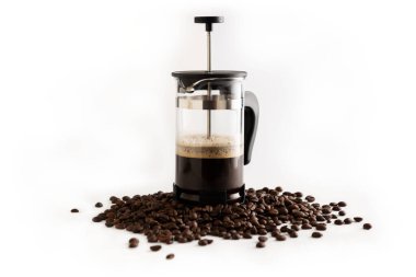 Coffee maker isolated on coffee beans background front view