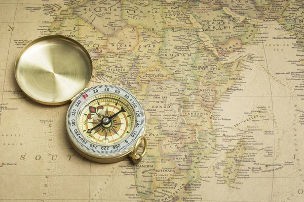 Travel destination Canada, ancient map with vintage compass — Stock ...