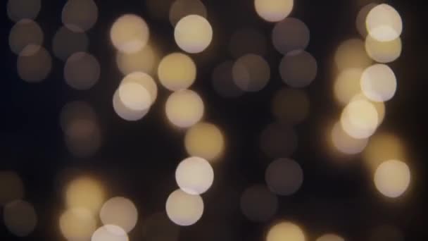Veelkleurige Bokeh Lichten Twinkelen Zwarte Achtergrond Nieuwjaarsvakantie Achtergrond Abstract Wazig — Stockvideo