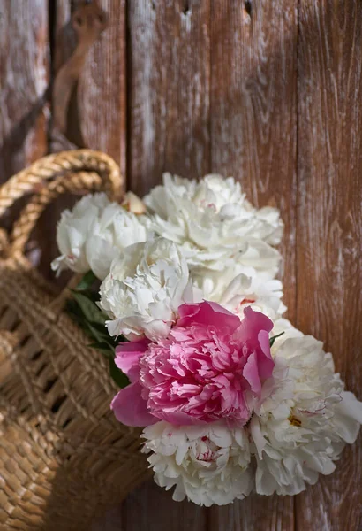 Flowers Pink Red White Peonies Wicker Basket Wooden Table Wooden — Stock Photo, Image