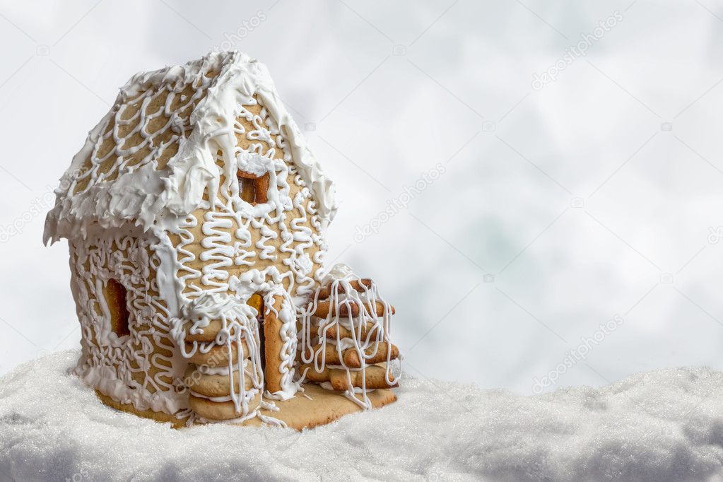 Christmas background gingerbread house in snow