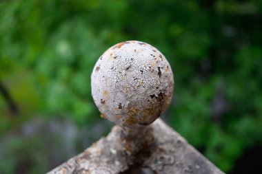 Cracked sphere. Depth of field. Illuminated by sun