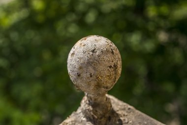 Cracked sphere. Depth of field. Illuminated by sun