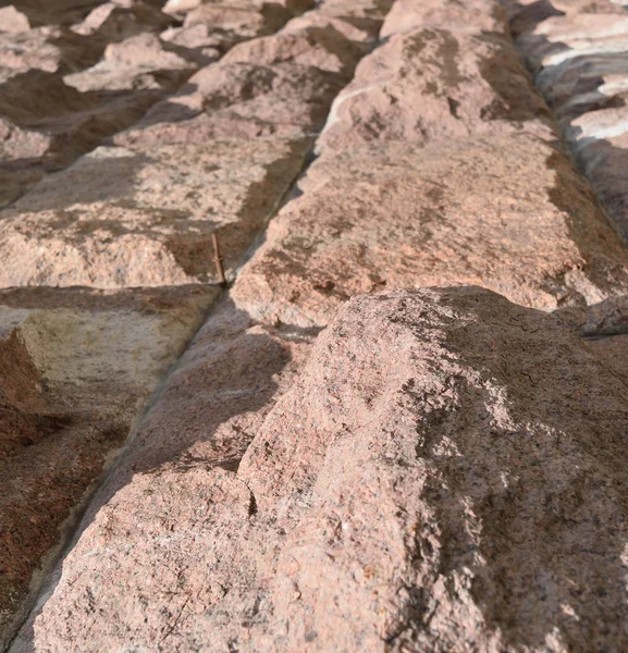 Uma parede de pedras. Pedra textura fundo — Fotografia de Stock