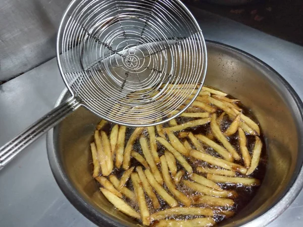 French fries stock on fried with oil