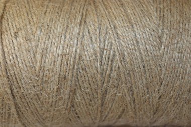 jute iplik makarası beyaz arkaplanda yakın plan