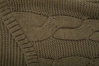 Sarı renkli yün kazak. Satmak için kumaş örgü.