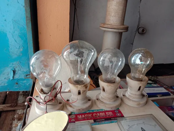 water colored electric 100 watt bulb stock on shop for sell