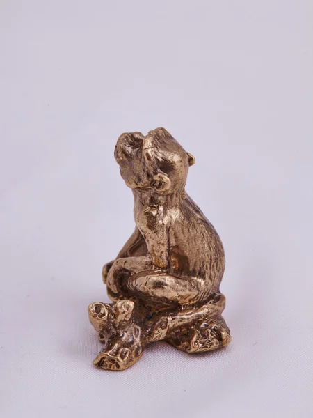 Mascota, la pequeña estatua del mono — Foto de Stock