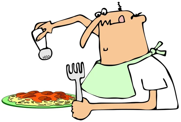 Homem salgando seu jantar de espaguete — Fotografia de Stock
