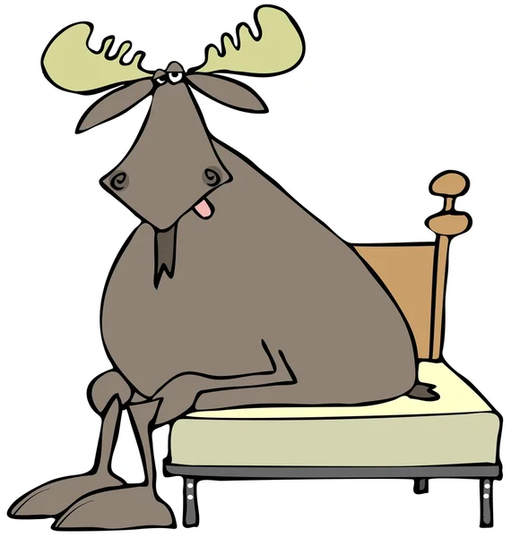 Tired moose sitting on a bed — Stock Photo, Image
