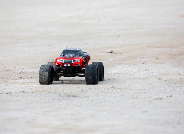 Radio controlled car model in race