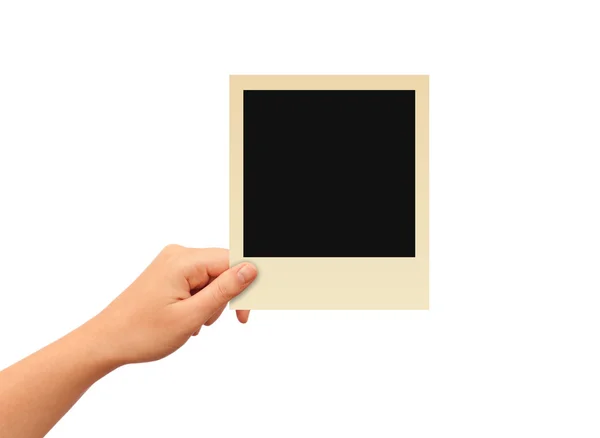 Hand holding photo frame — Stock Photo, Image