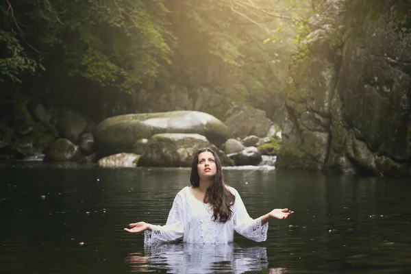 Beautiful young woman praying — Stock Photo, Image