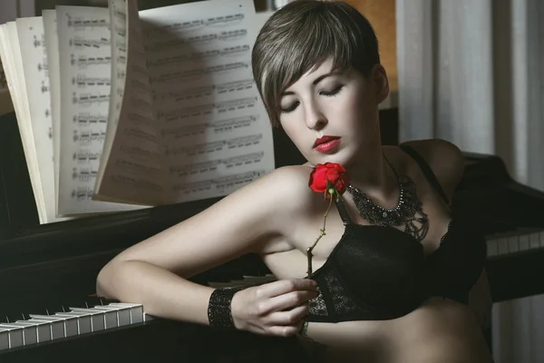 Beautiful seductive woman with red rose — Stock Photo, Image