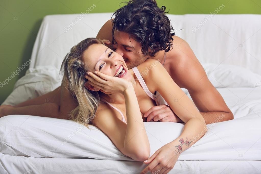 couple playing in bed