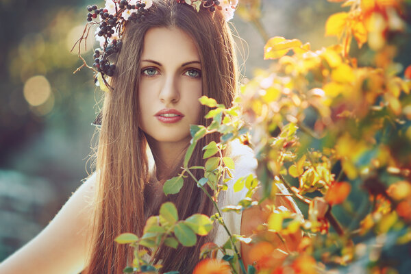 Beautiful woman in spring light and colors. Seasonal portrait
