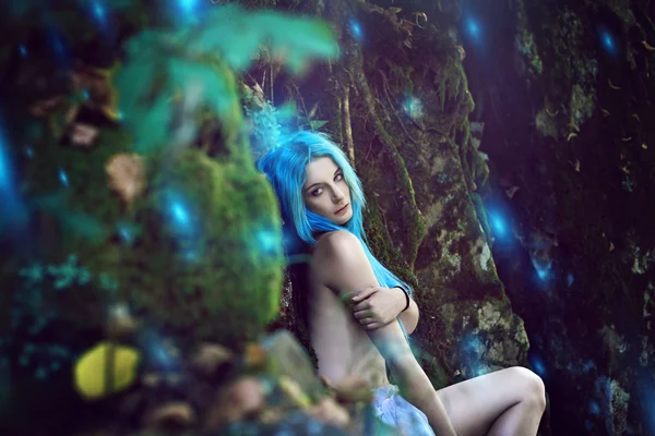 Ethereal nymph with surreal forest lights — Stock Photo, Image