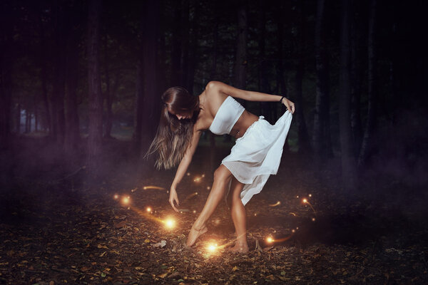 Dancing with the forest spirits . Fantasy and surreal
