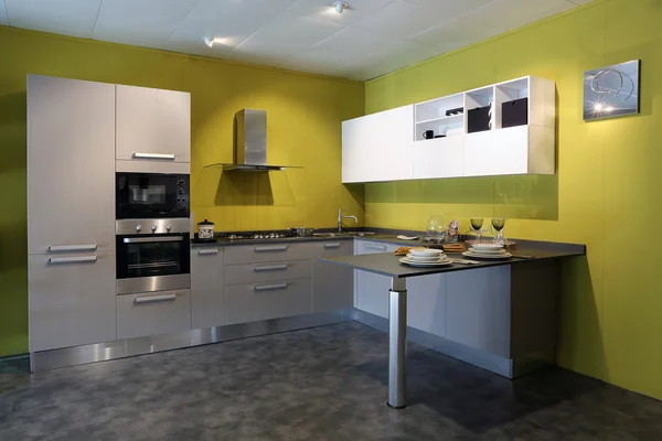 Full view of a modern steel kitchen — Stock Photo, Image