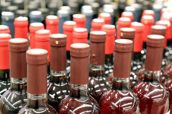 Wine Bottles Row Selective Focus Liquor Store Red Rose Wine — Stock Photo, Image