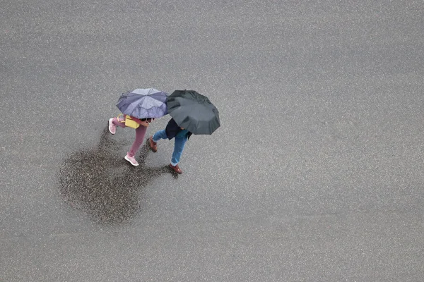 Rain City Couple Umbrellas Crossing Wet Road Top View Rainy — Stock Photo, Image