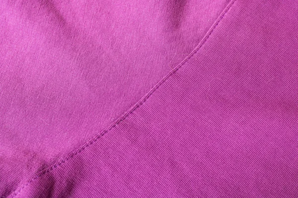 木製の背景にピンクのセーターの一部を閉じる — ストック写真