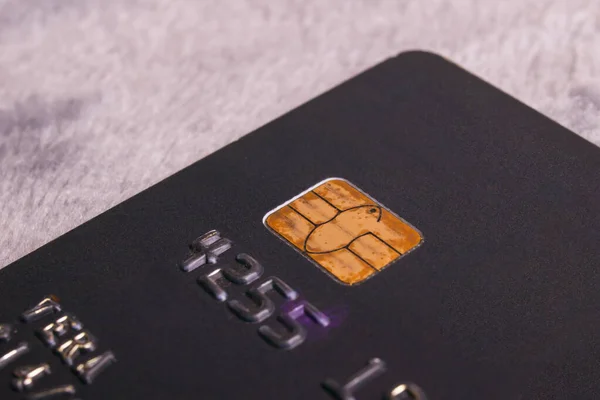 Bank card on a gray background closeup