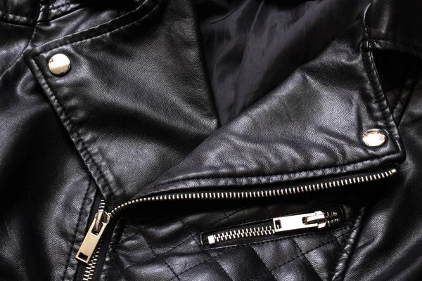 Black leather jacket with zip and stud close up