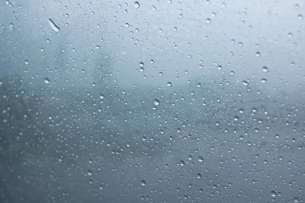 Hujan Atas Kaca Dengan Tutup Biru Foto Makro — Stok Foto