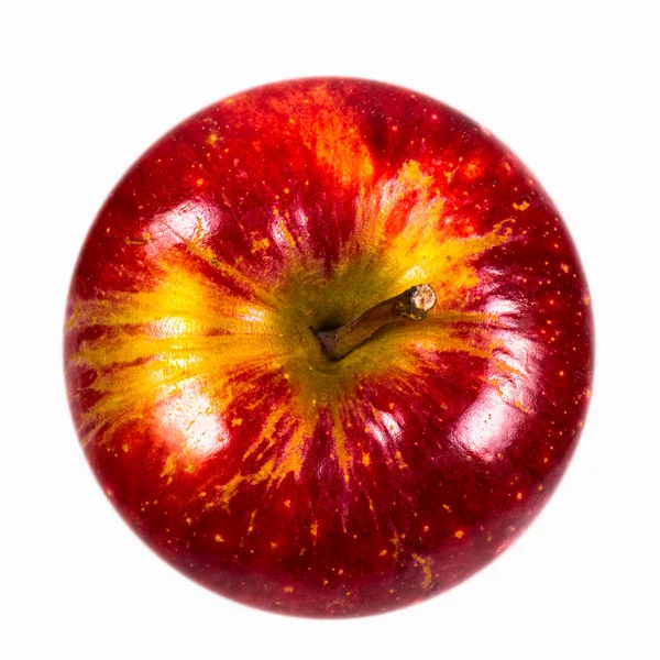 Beyaz bir arka plan üzerinde yukarıdan Red Delicious elma vurdu