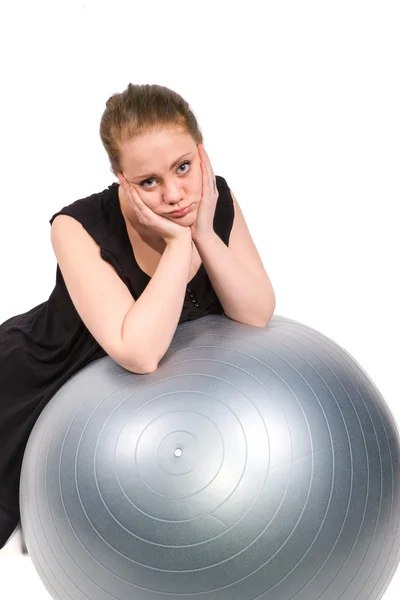 Bored woman who is unwilling to exercise — Stock Photo, Image