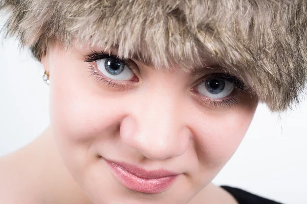 Closeup of charming young woman looking straight into the camera — Stock Photo, Image