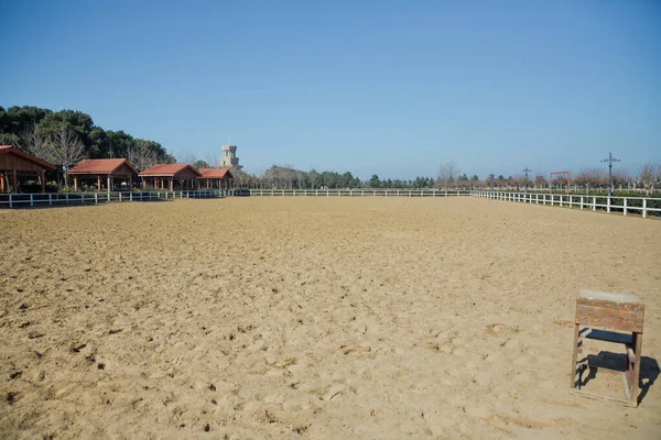 Azerbaijan, Omar Equestrian Center. 10.03.2021. Horse stables . A large arena with sand for horses . Elite Horse and Polo Club . training ground. horse club. Sand Stadium for horseback riding. Horse home .
