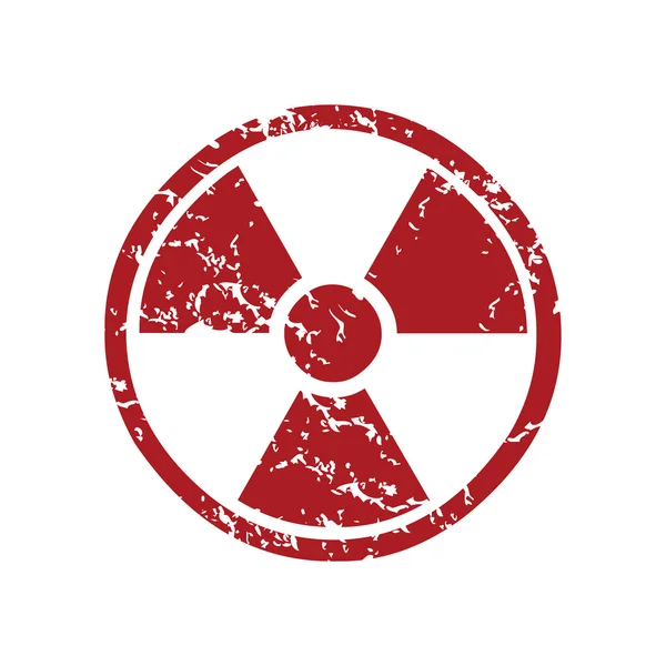 Red grunge nuclear logo — Stock Vector