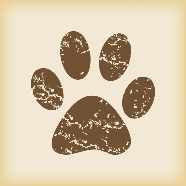 Grungy paw print icon — Stock Vector