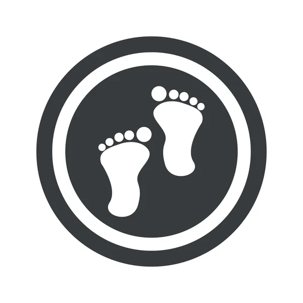 Ronde zwarte voetafdruk teken — Stockvector